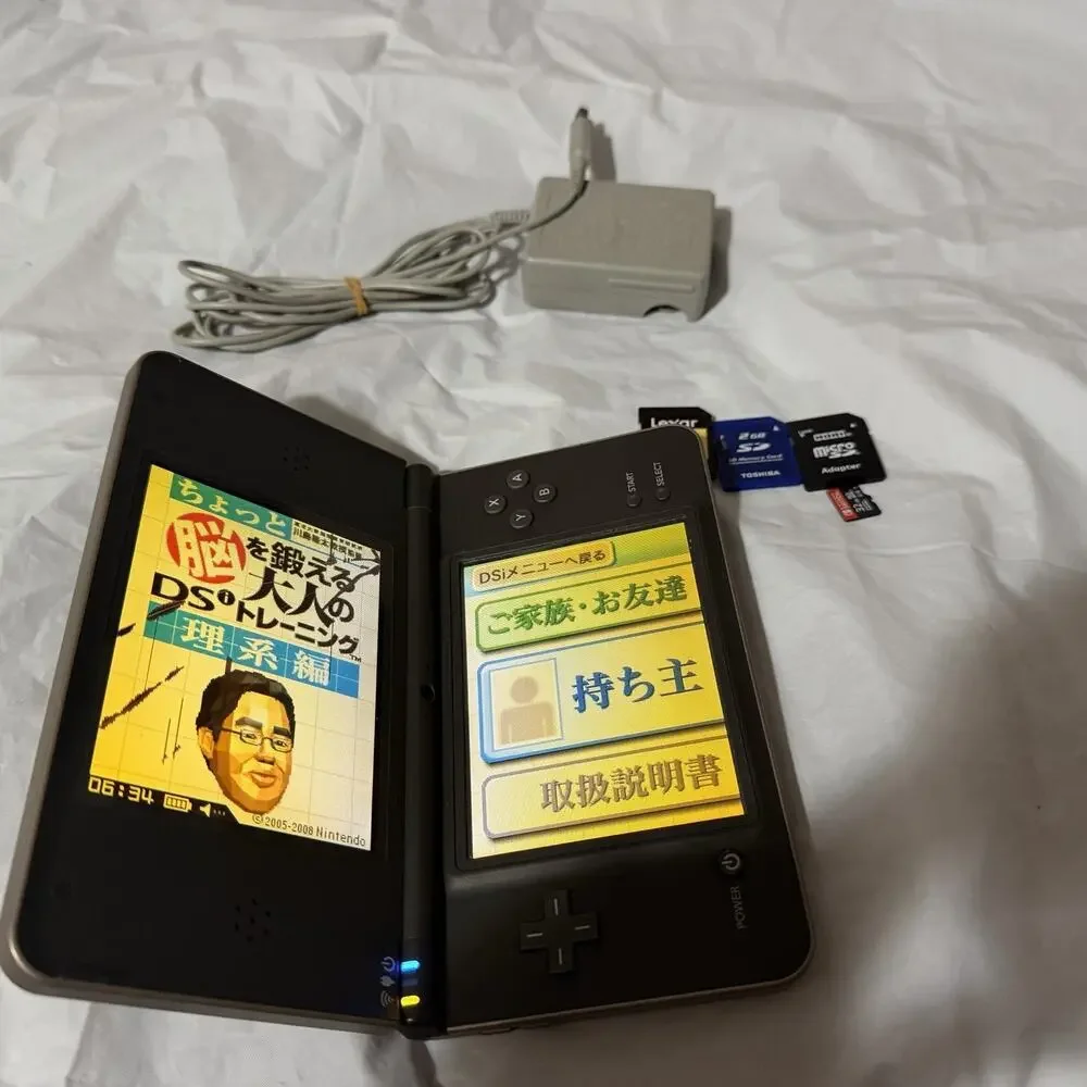 Nintendo DSi LL Bronze/Dark Brown Japanese Version Plays US Games RD DESCRIPTION